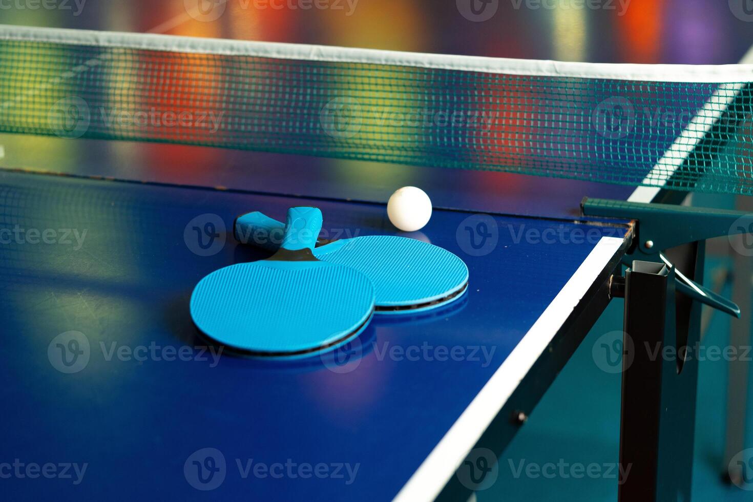 Ping Pong Table With Two Ping Pong Paddles photo
