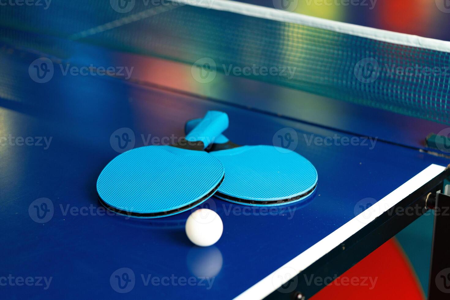 Ping Pong Table With Two Ping Pong Paddles photo