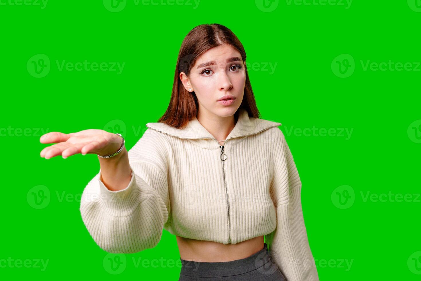 Woman in White Sweater Holding Out Hand photo
