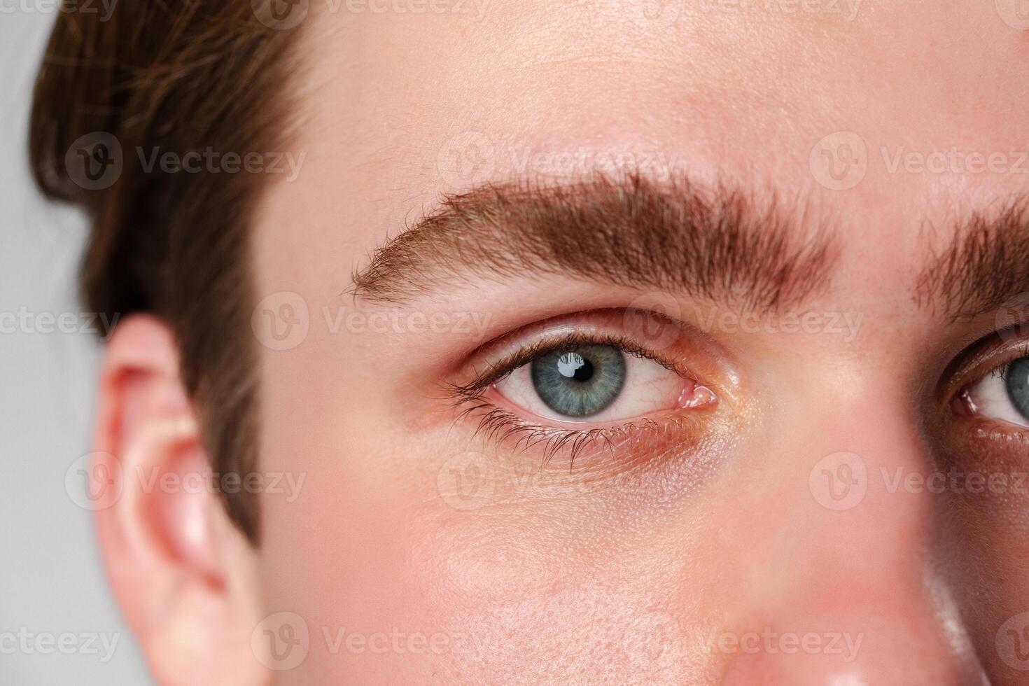 Close Up of a Man With Blue Eyes photo