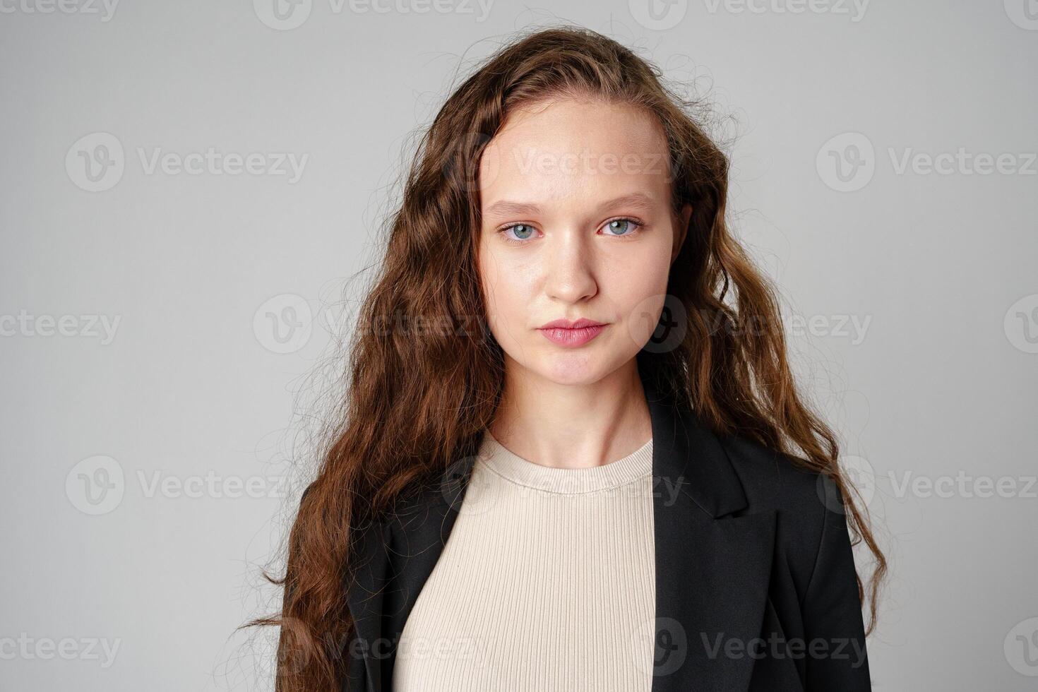 Young Girl With Long Curly Hair Portrait photo