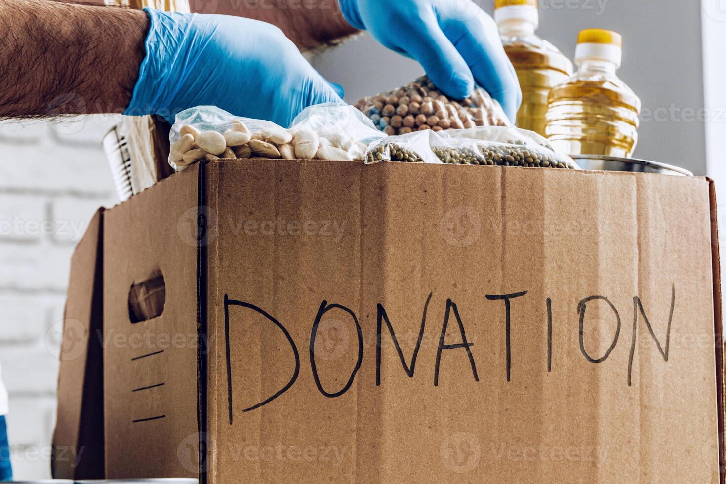 Donation box of food for people suffering from coronavirus pandemia photo
