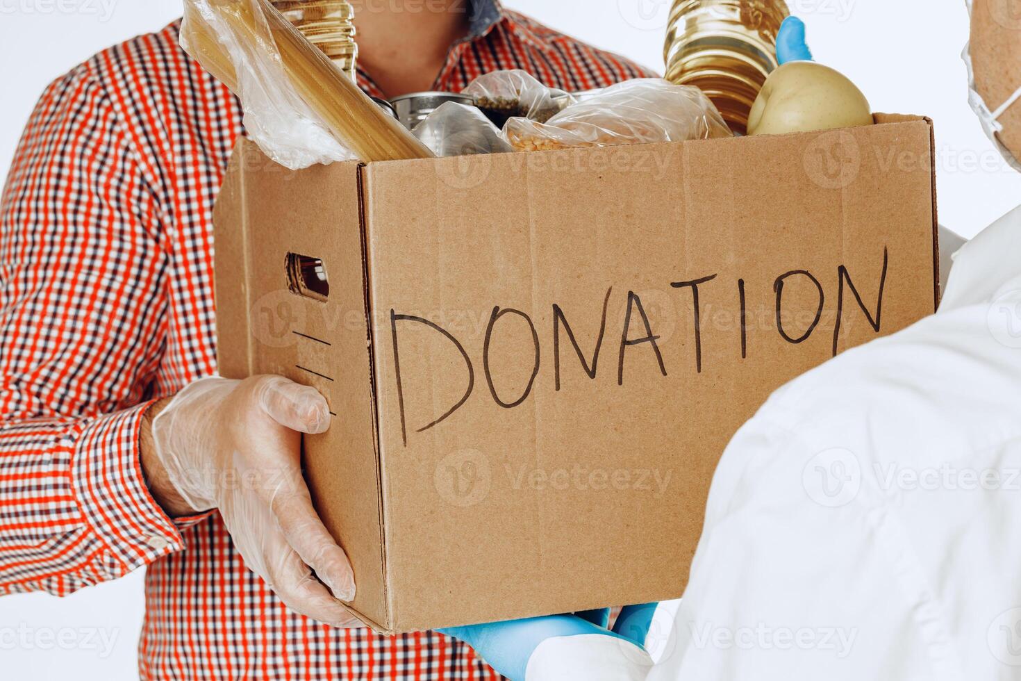 Donation box of food for people suffering from coronavirus pandemia photo