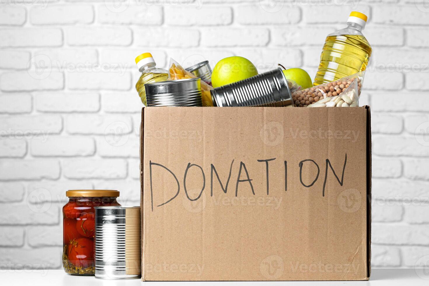 Donation box with various food. Pandemic support. photo
