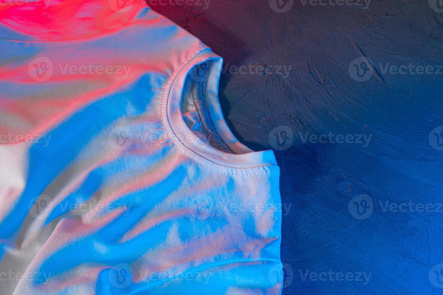 White color unisex t-shirt in neon light photo