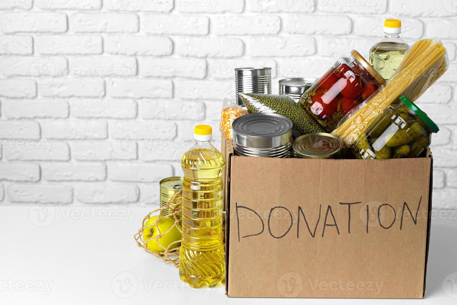 Donation box with various food. Pandemic support. photo