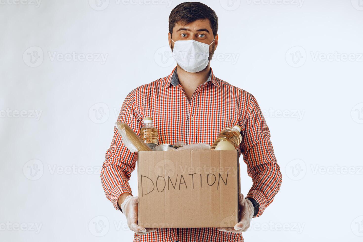 Donation box of food for people suffering from coronavirus pandemia photo