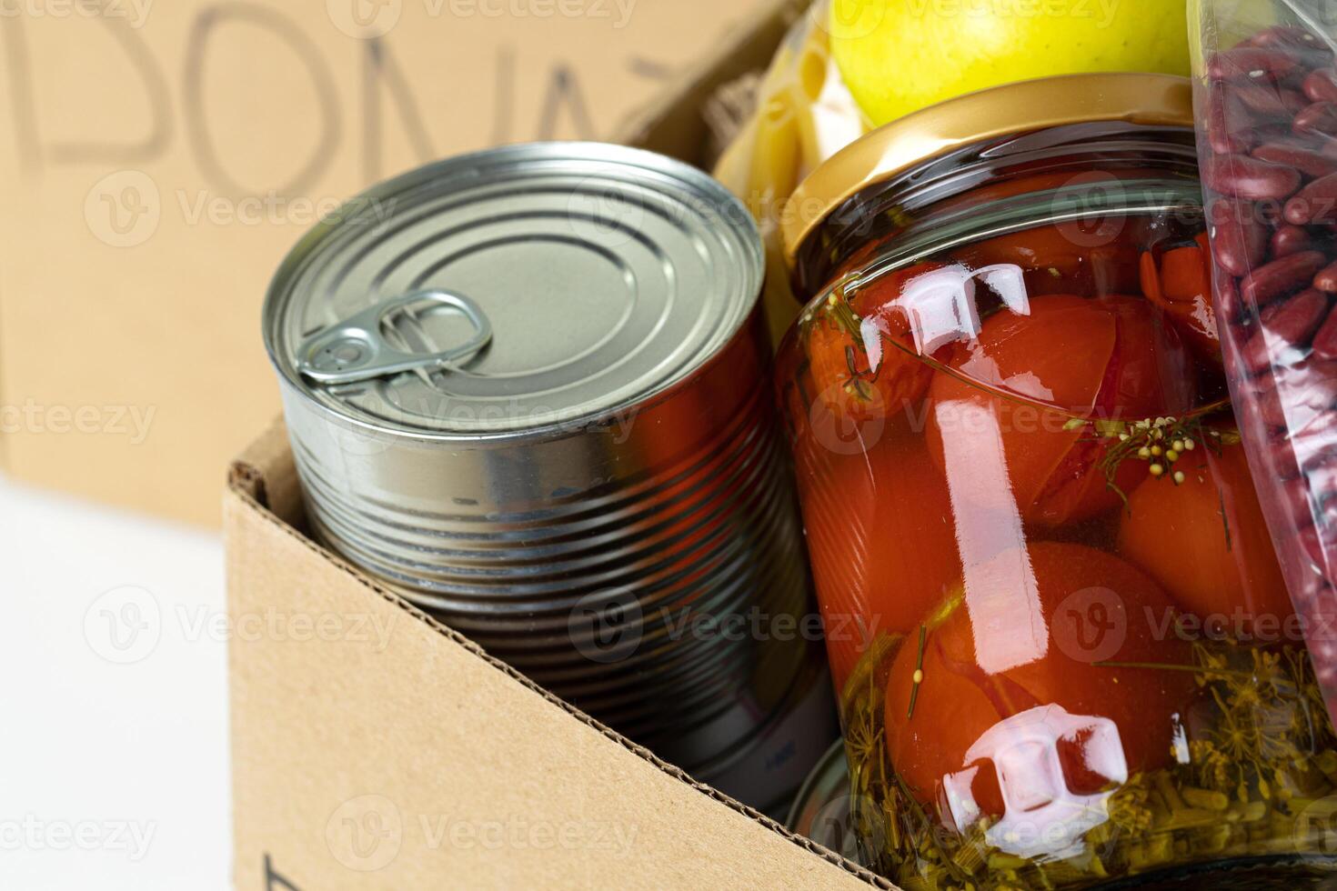 Donation box with various food. Pandemic support. photo