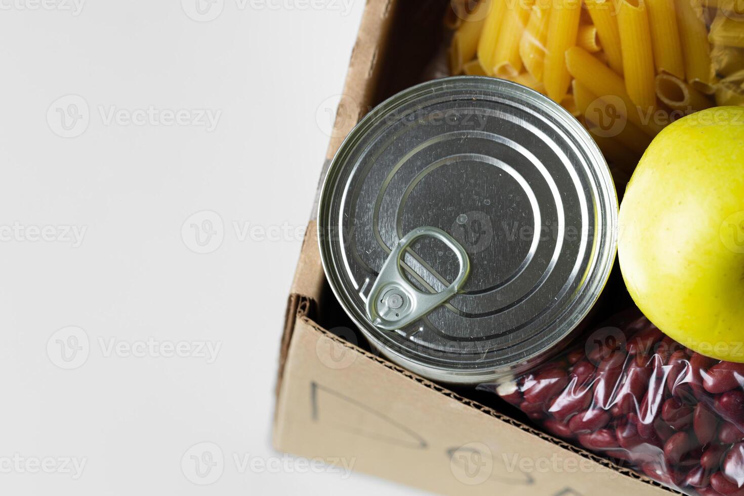 Donation box with various food. Pandemic support. photo