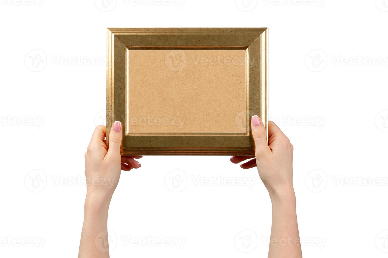 Female hands holding photo frame isolated on white