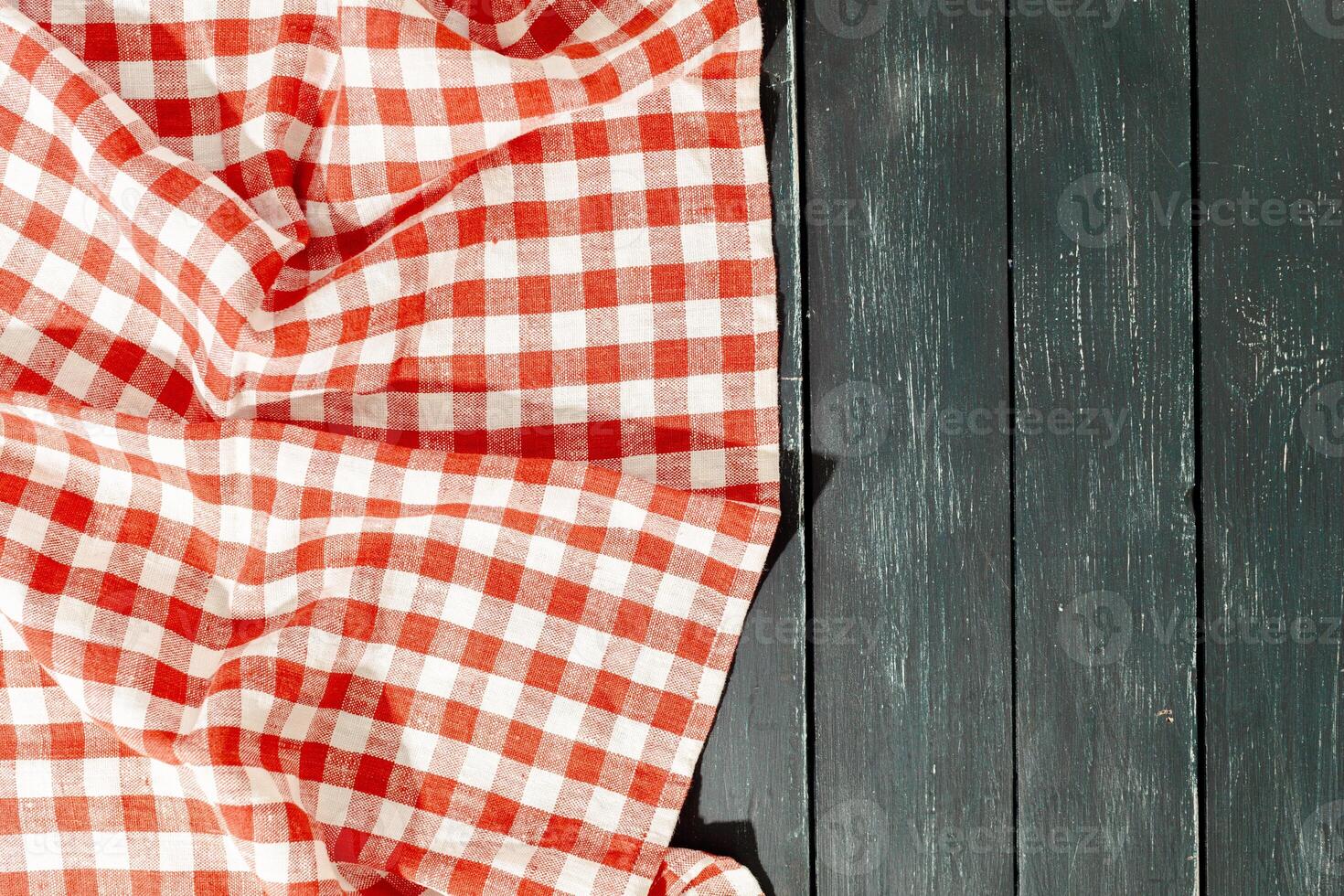tablecloth on black wooden table photo