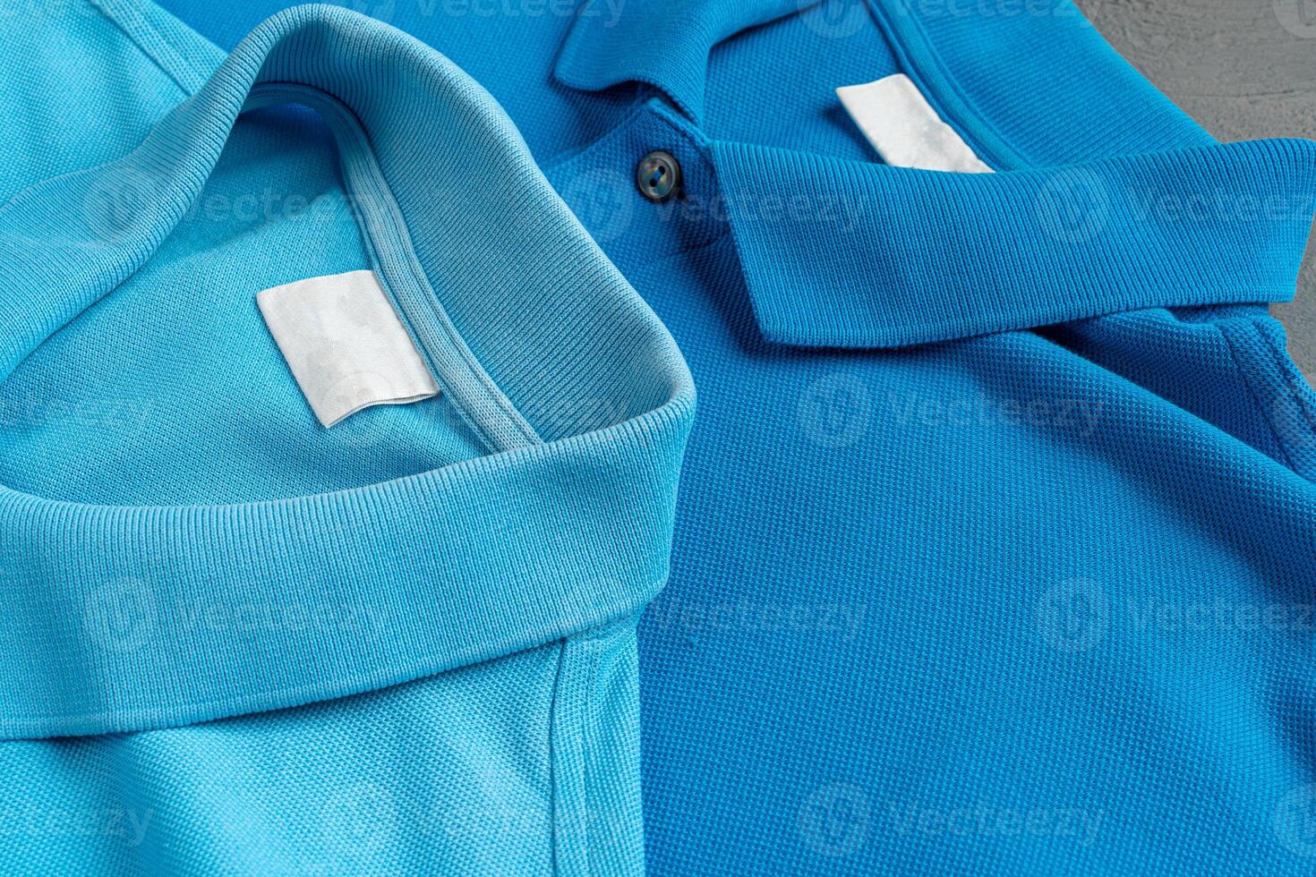 Blue cotton polo t-shirt texture close up photo