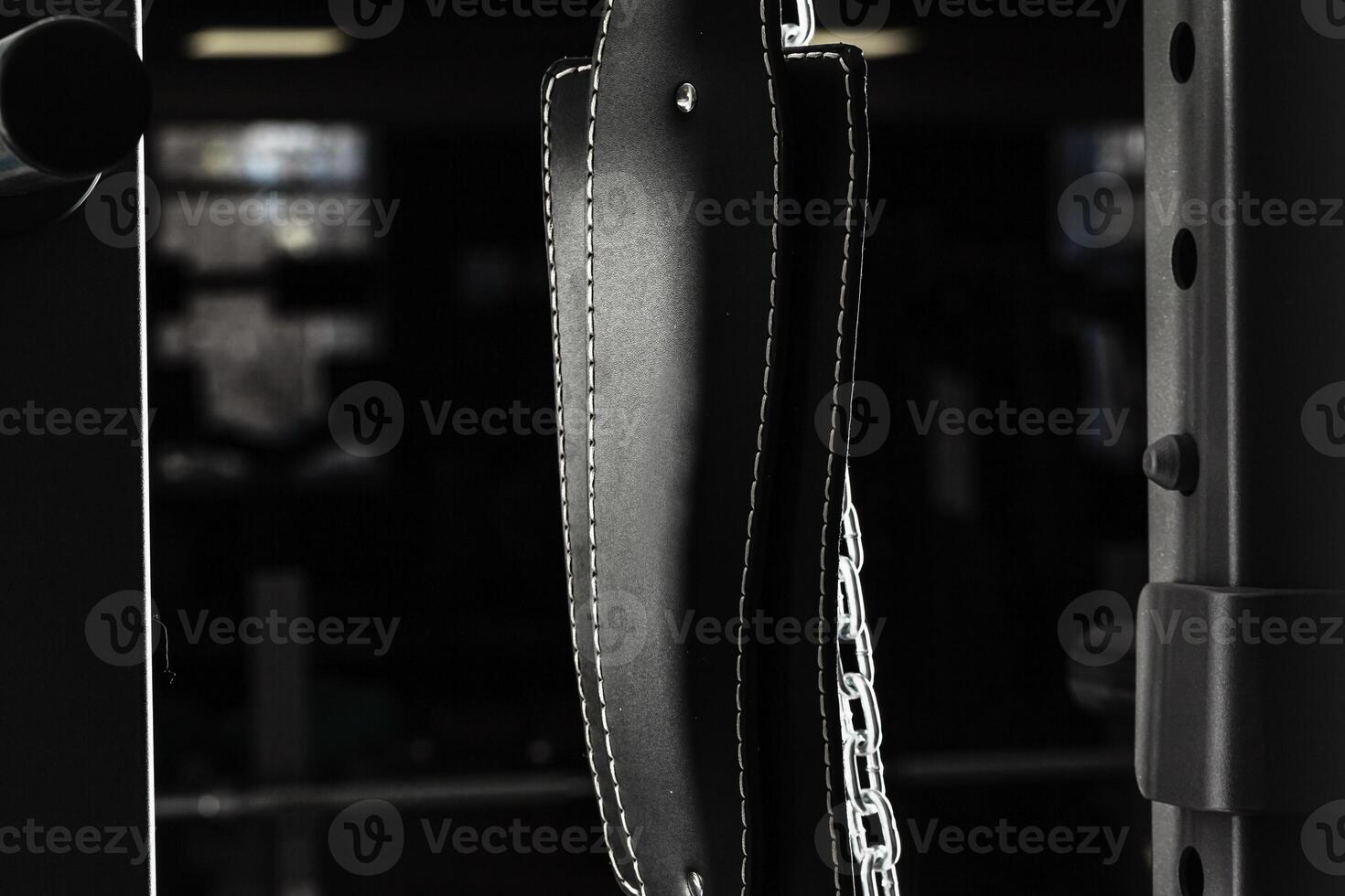 Weightlifting belt on a training apparatus close up photo