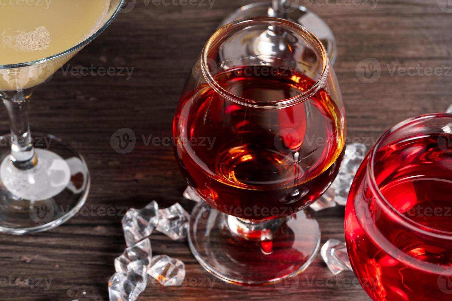 Selection of alcohol drinks in different glasses photo