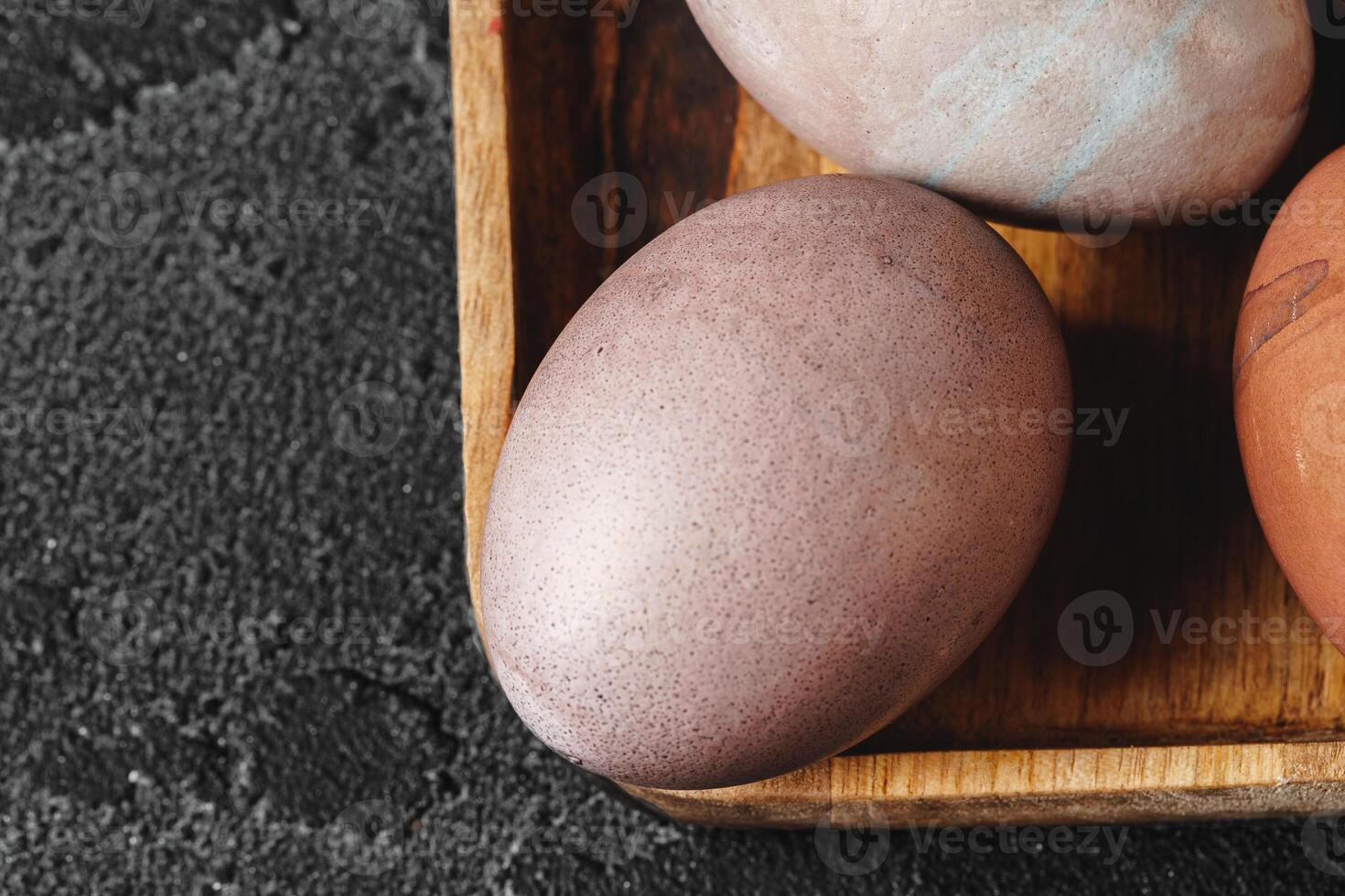 Easter eggs on a dark background photo