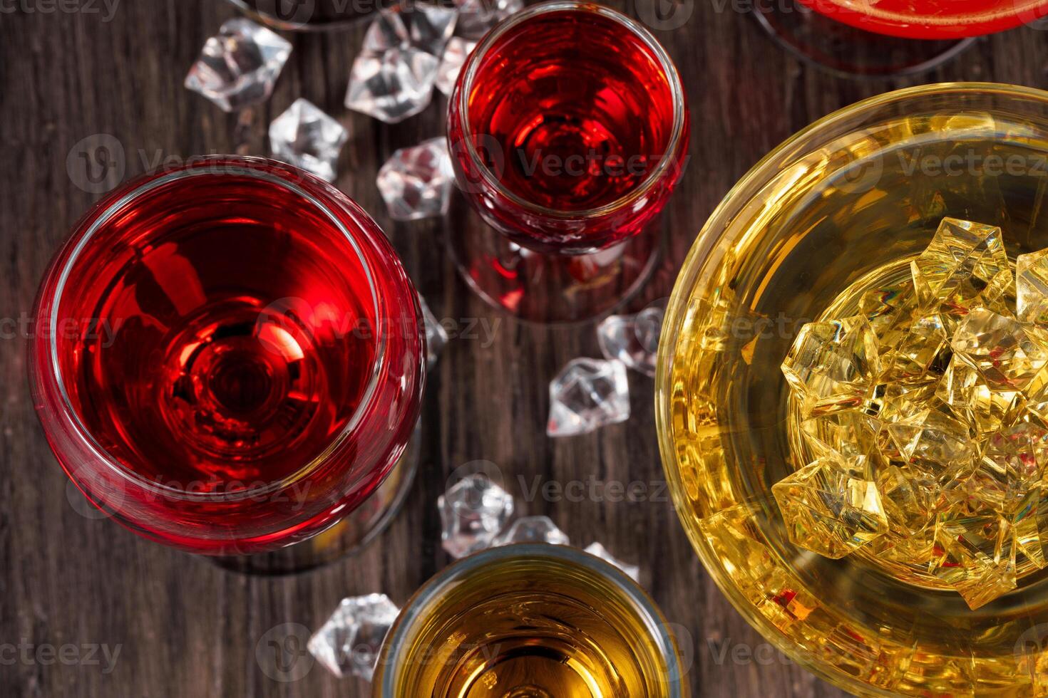 Selection of alcohol drinks in different glasses photo