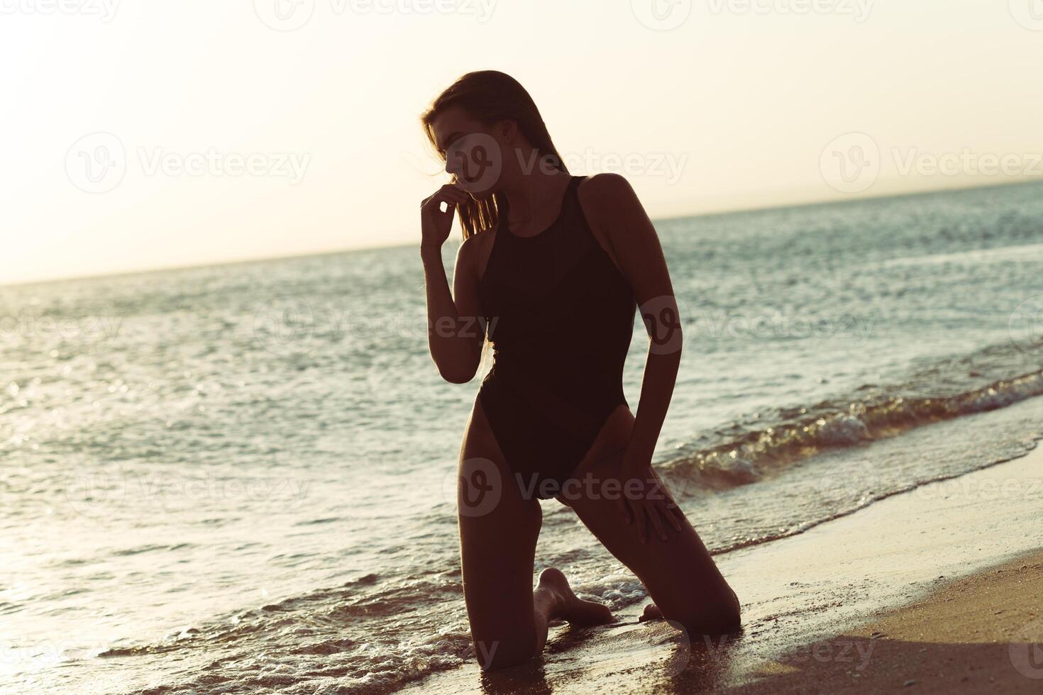 Woman is alone at beach photo