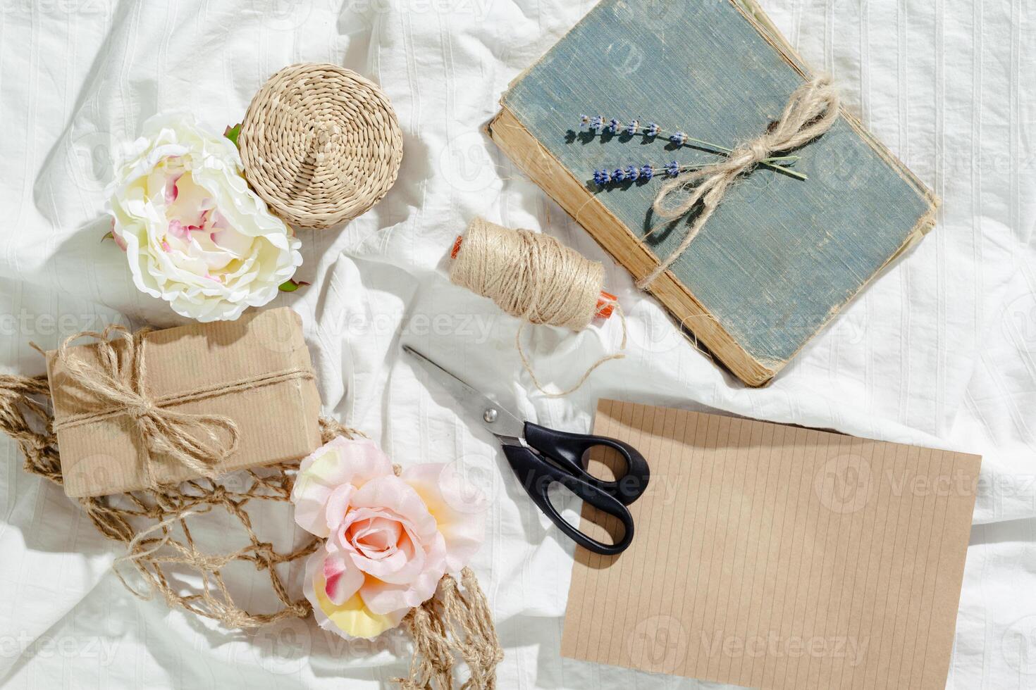 flowers with empty vintage notebook for your design photo