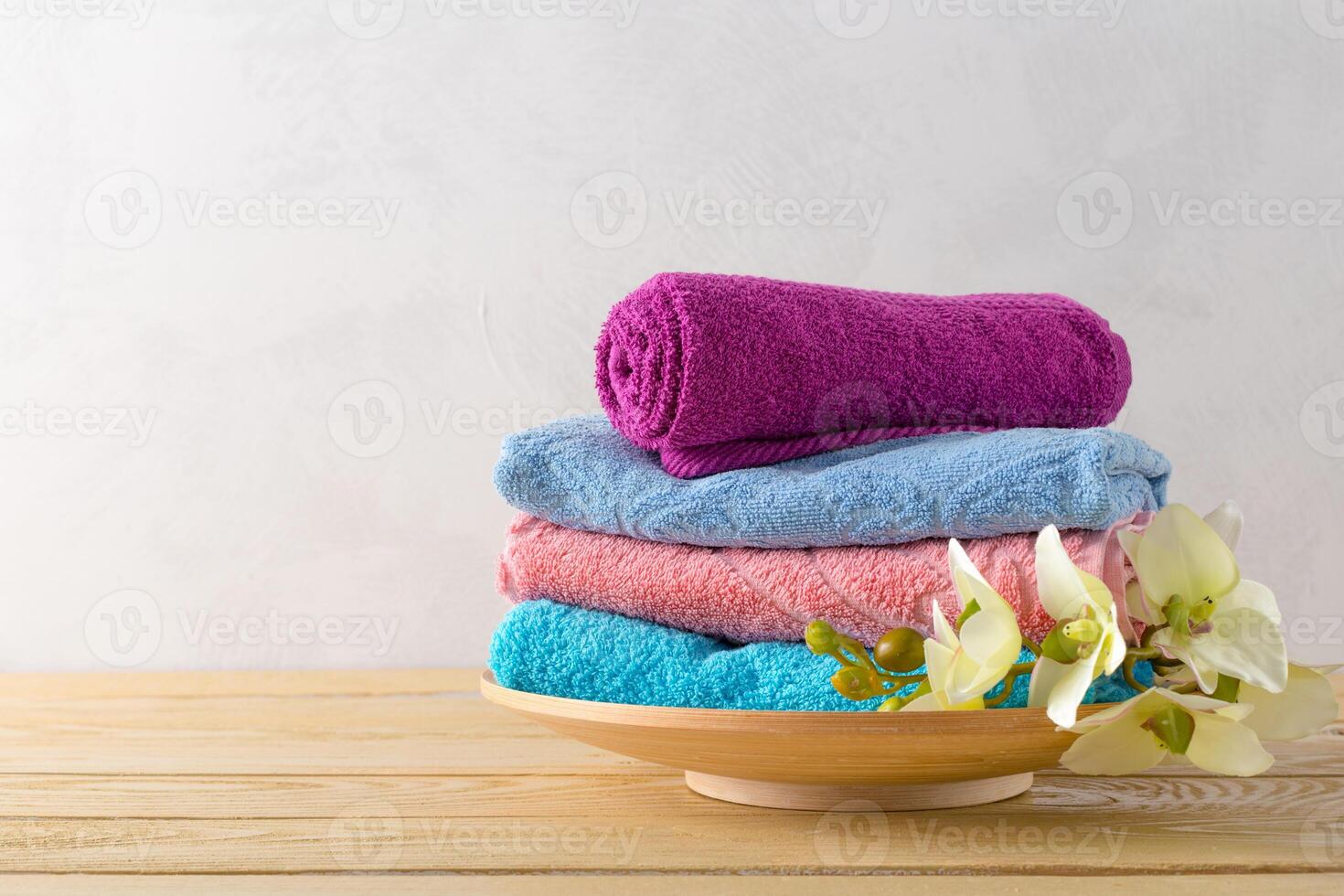 towels roll with flower photo