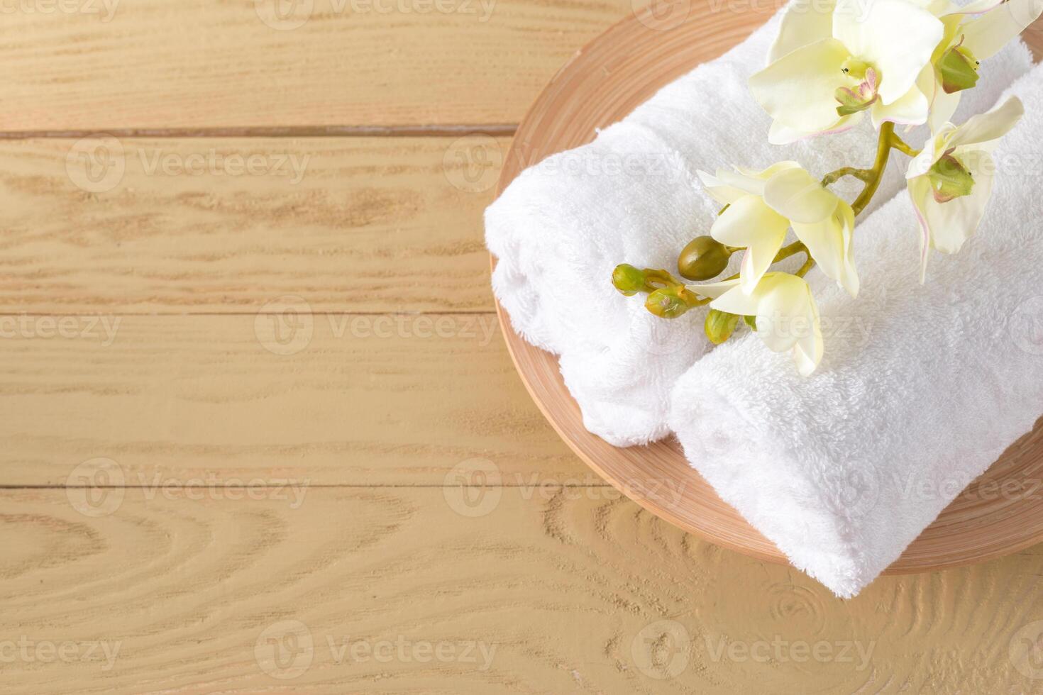 towels roll with flower photo