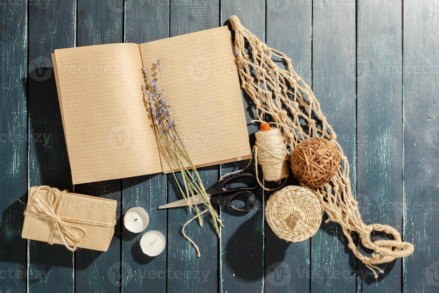 flowers with empty vintage notebook for your design photo