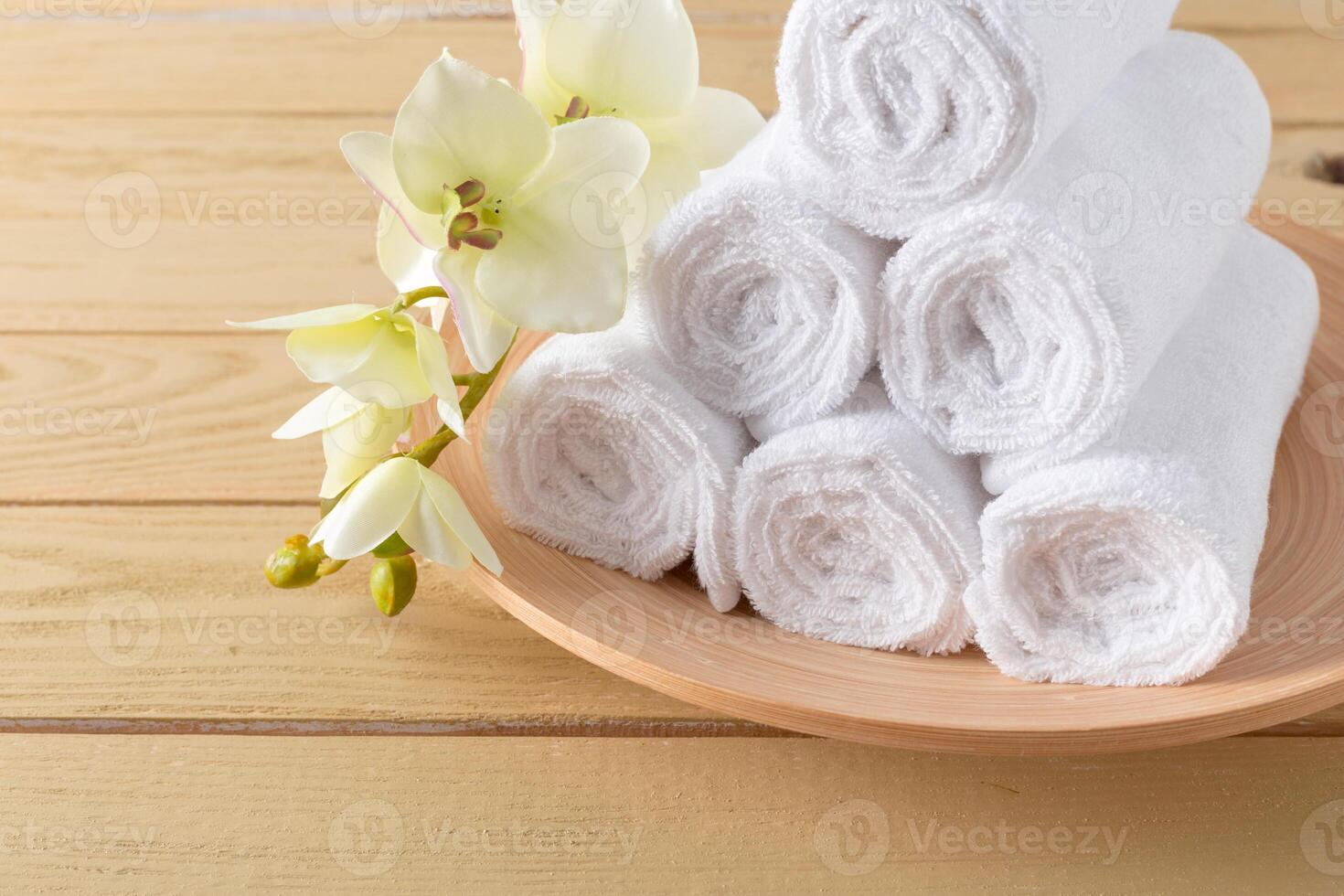 towels roll with flower photo