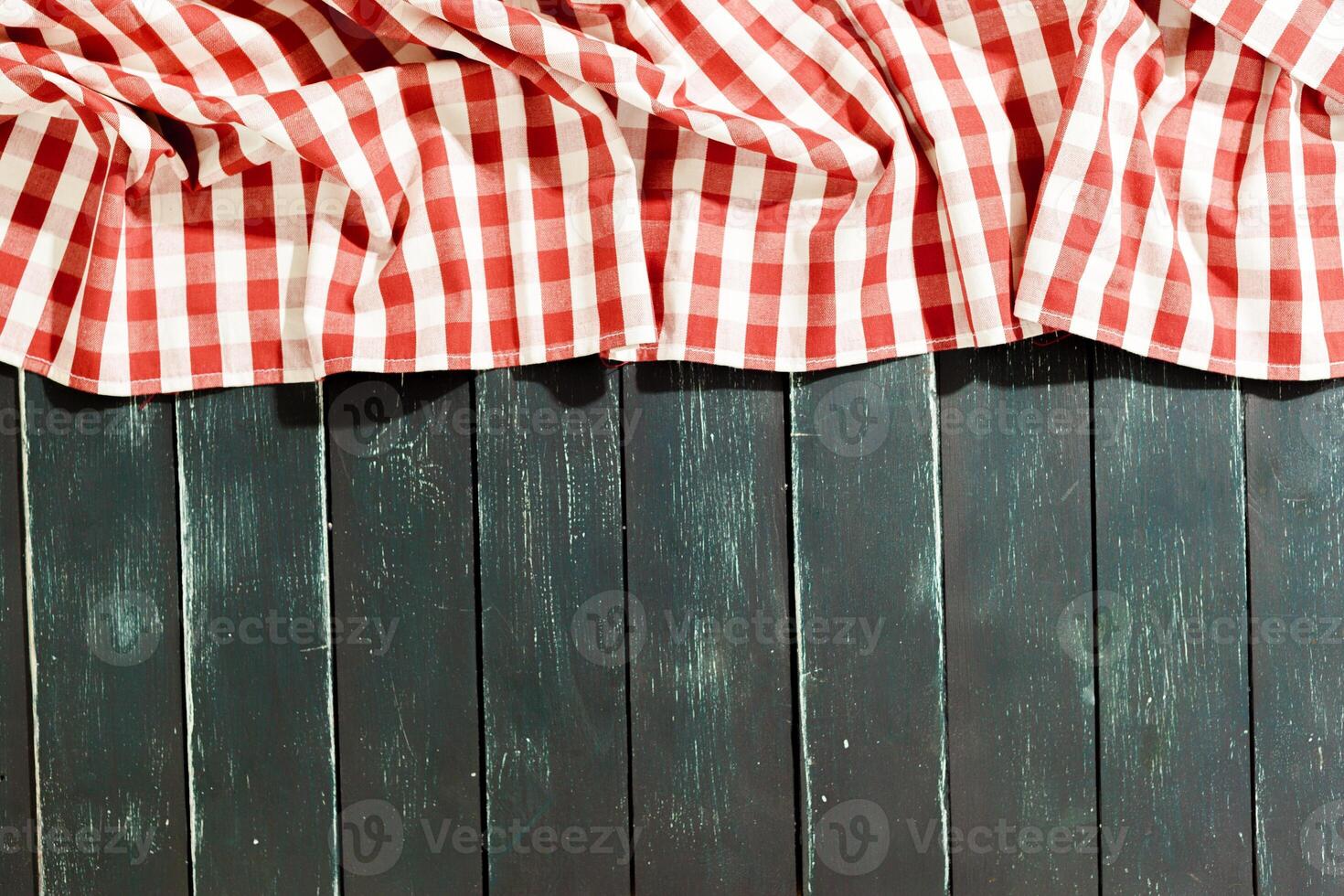 tablecloth on black wooden table photo