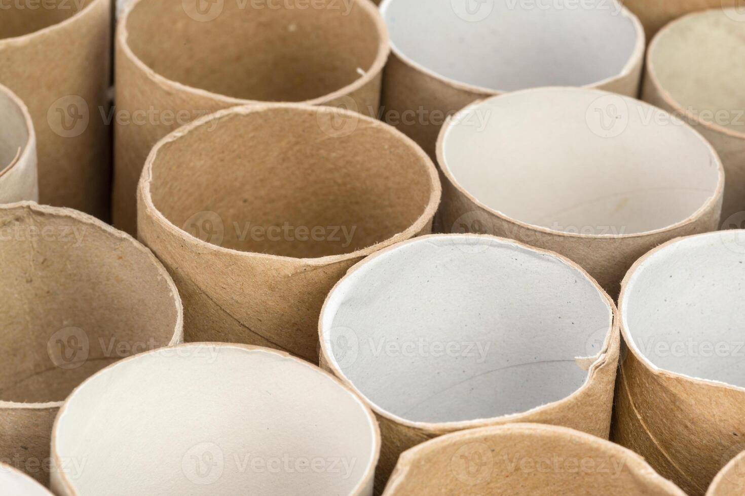 Empty toilet paper on white background photo