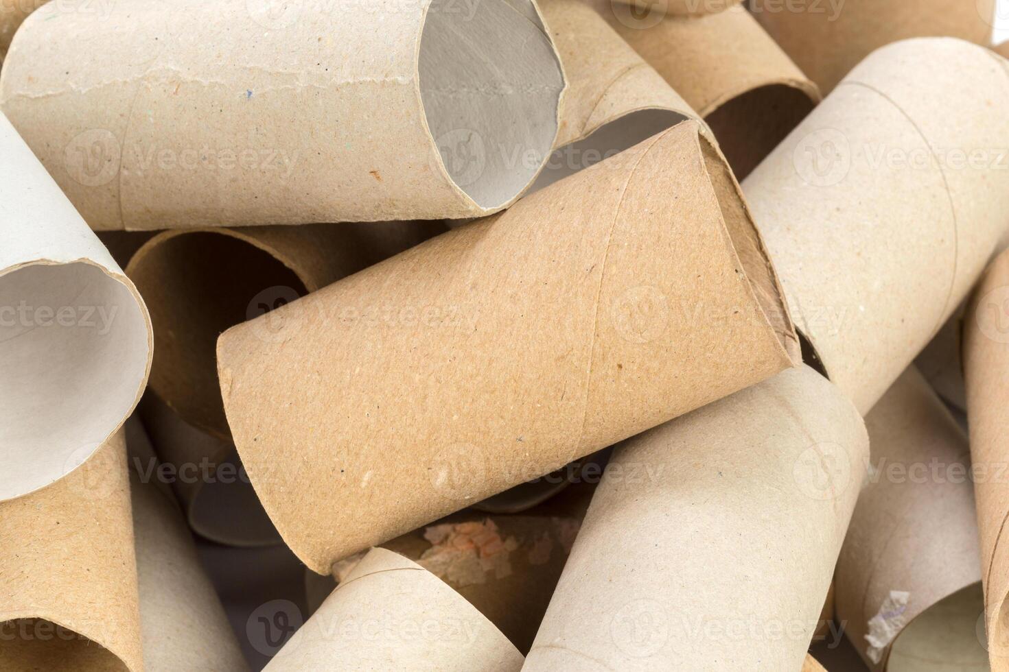 Empty toilet paper on white background photo