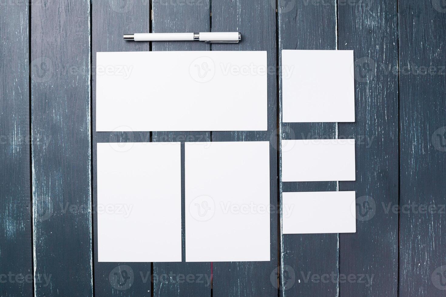 Mock up on wooden desk photo