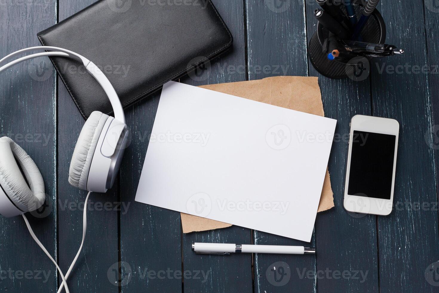 Blank note book on table, top view photo
