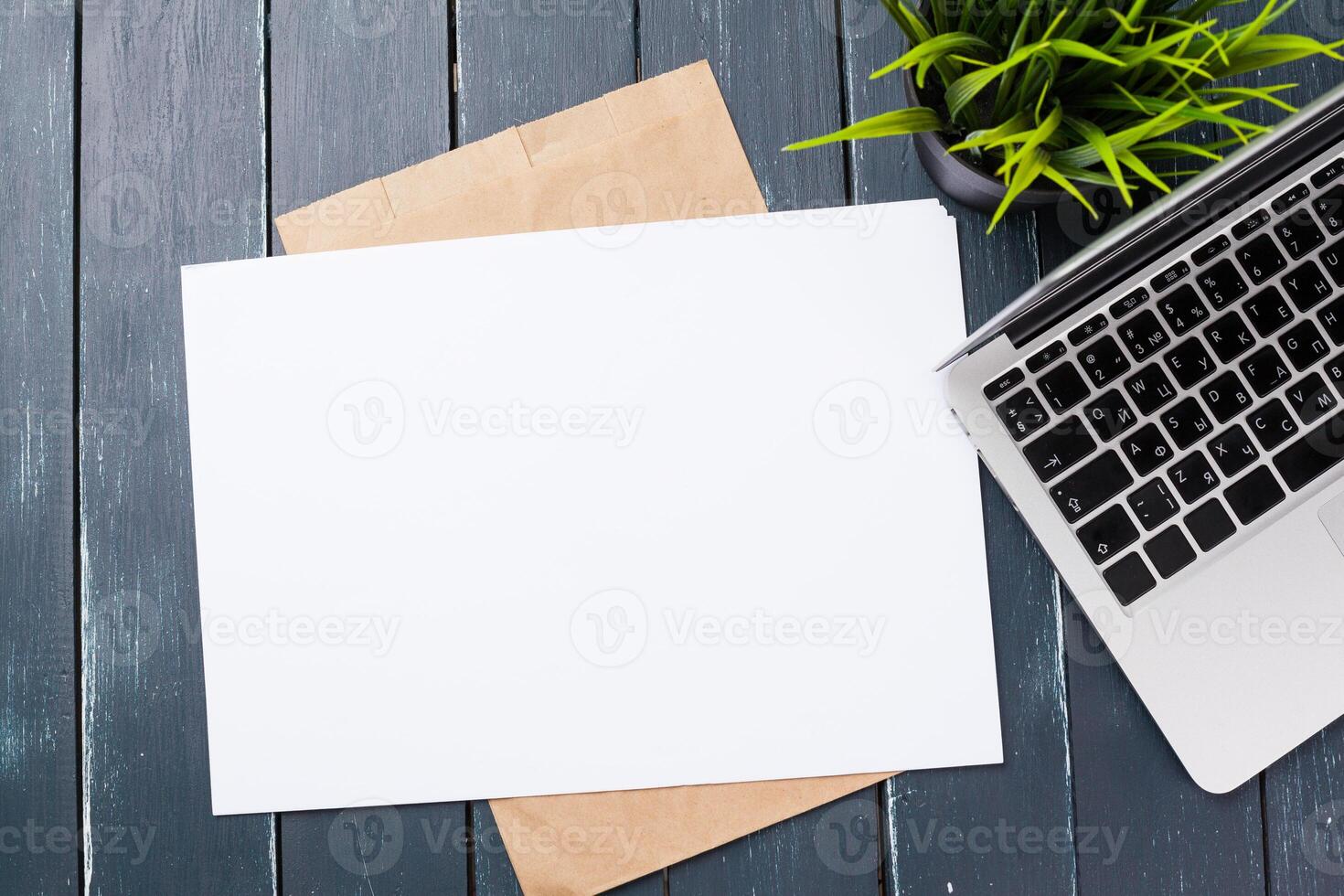 Blank note book on table, top view photo