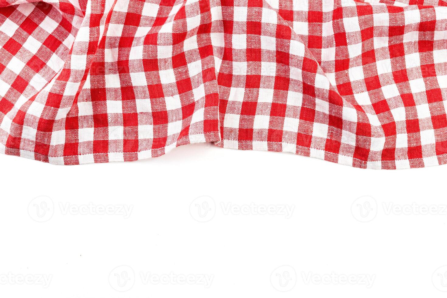 red folded tablecloth isolated on white photo