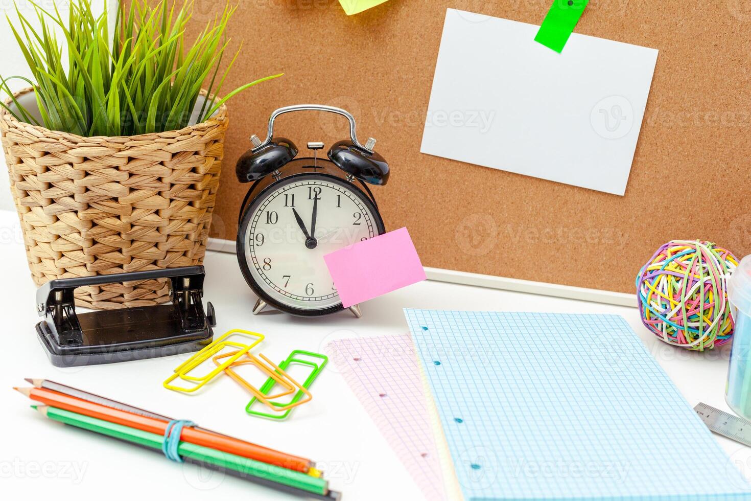 Work place of a creative person with a variety of colorful stationery objects photo
