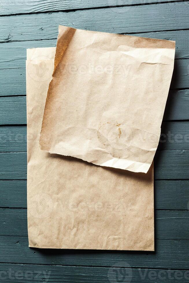 crumpled sheet of paper and pencil photo