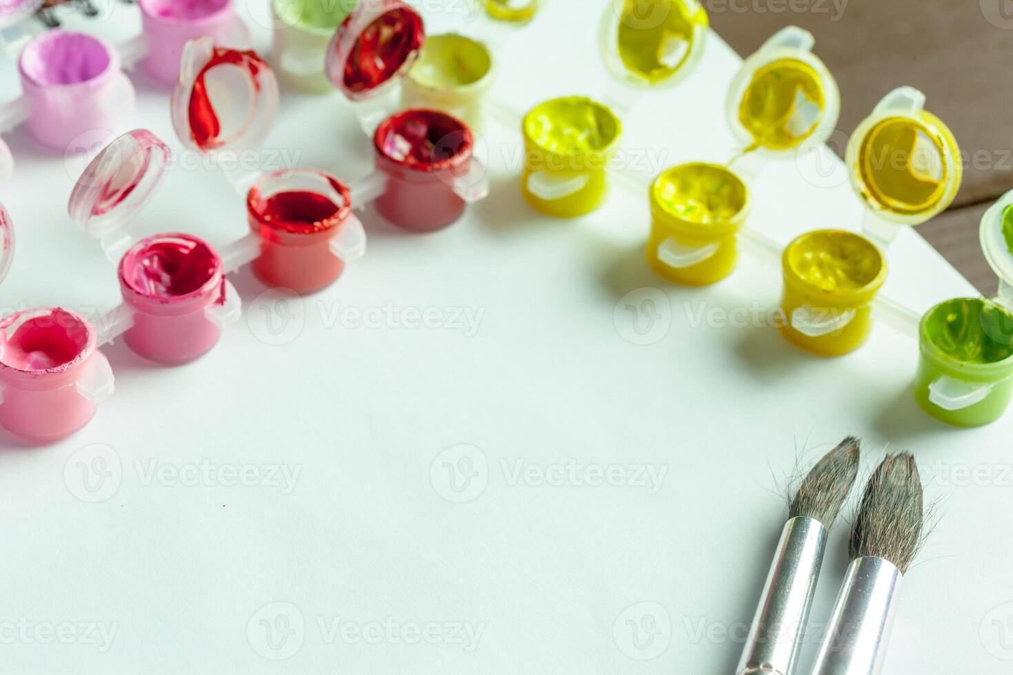 set of brightly colored acrylic paint photo