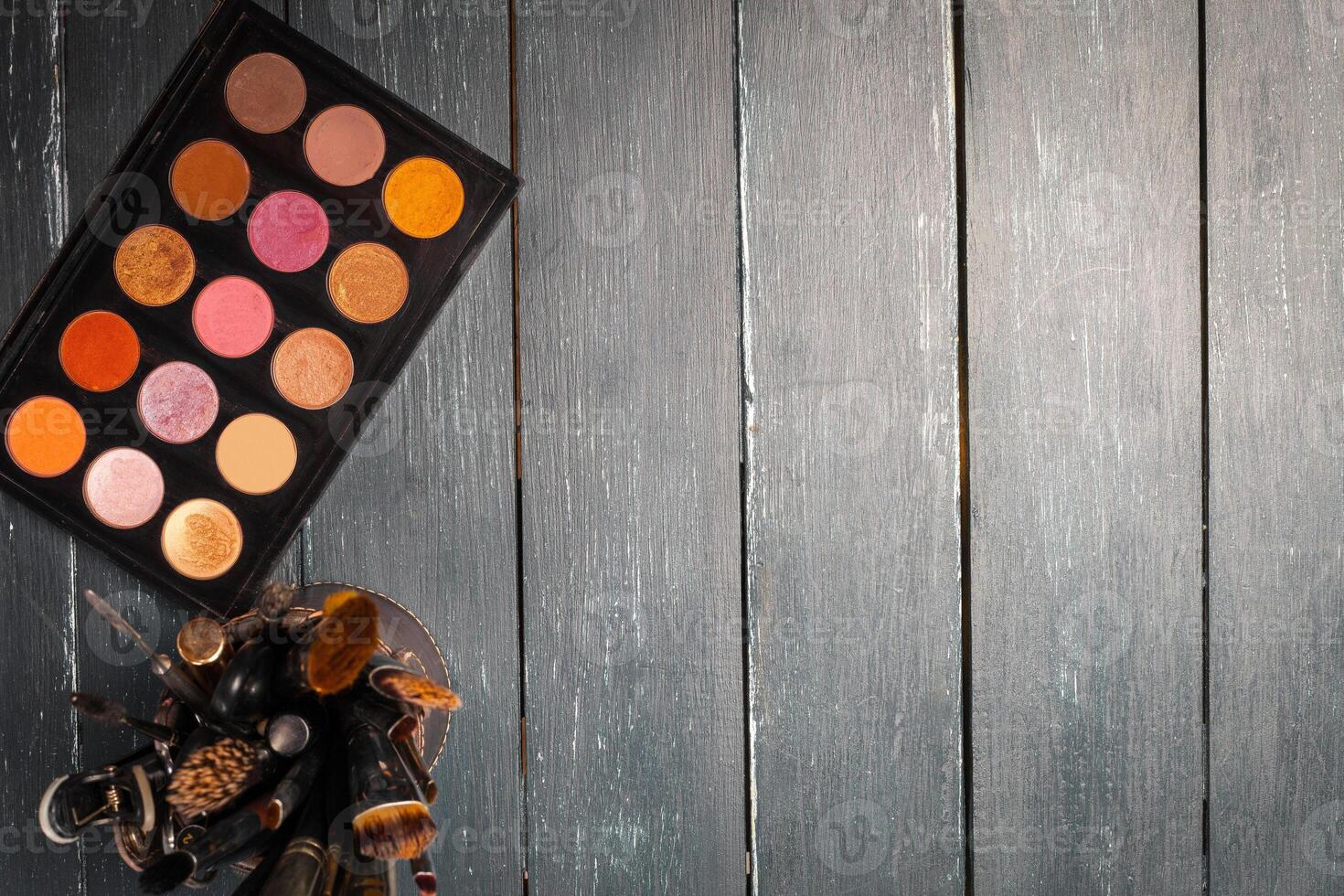 Makeup brushes and make-up eye shadows photo