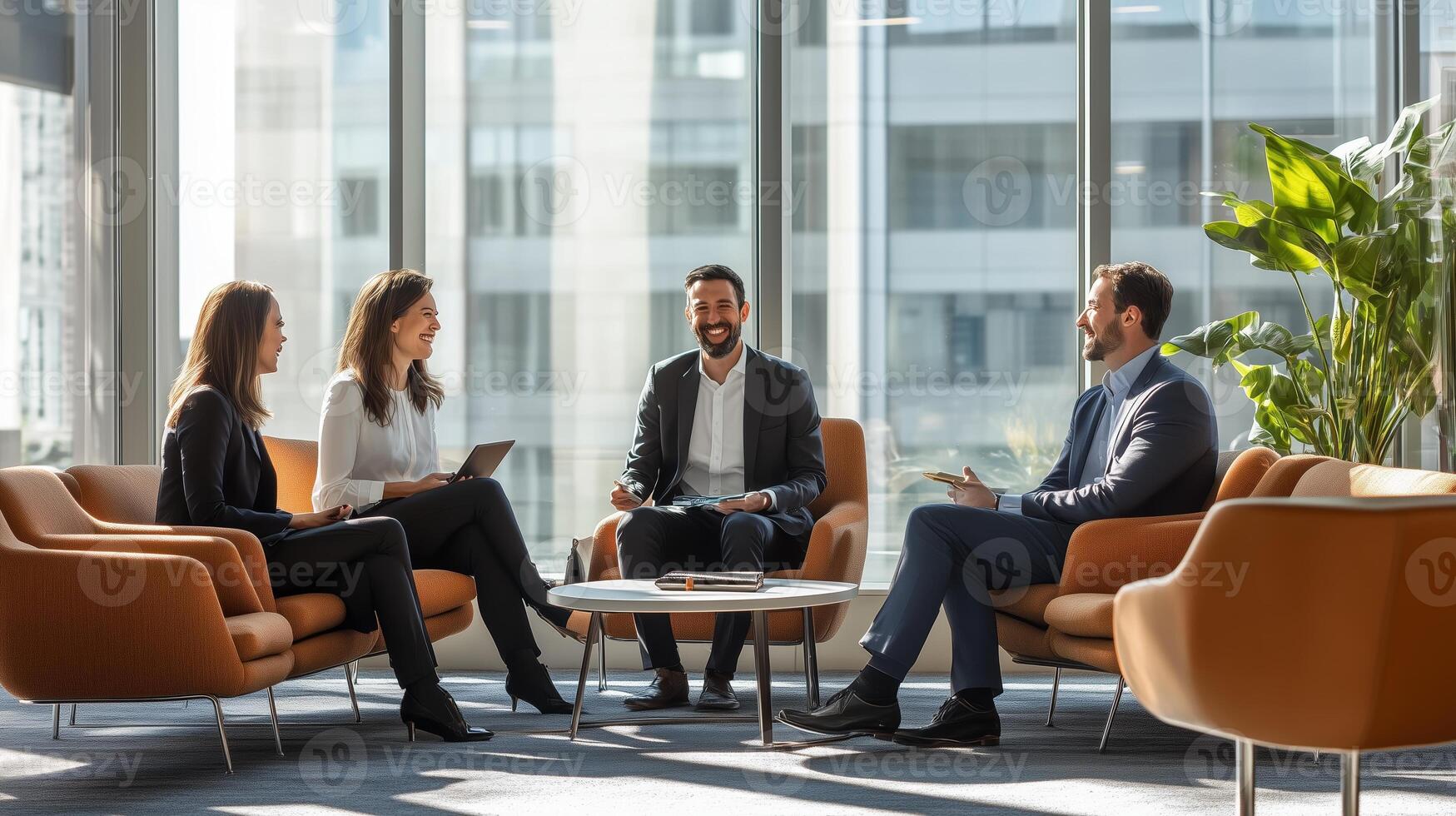 Business professionals engaging in a collaborative meeting in a modern office space during daylight hours photo