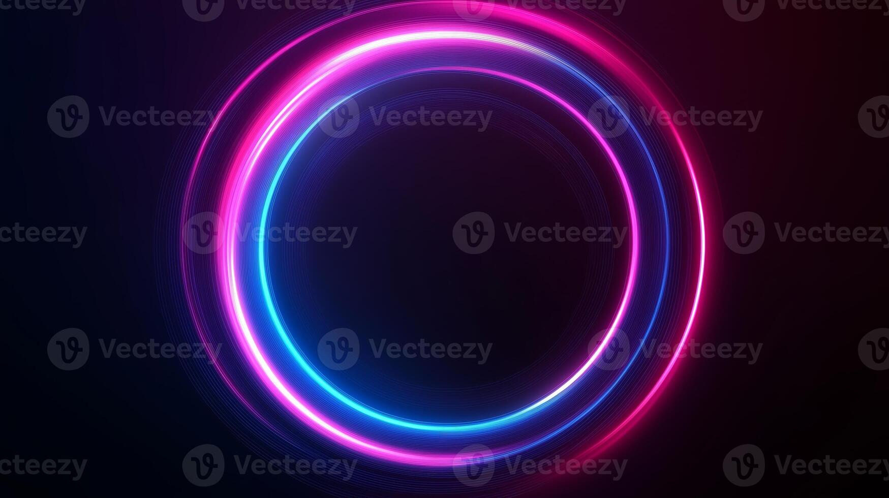 A vibrant glowing circular light design in pink and blue tones on a dark background creates a striking visual effect photo