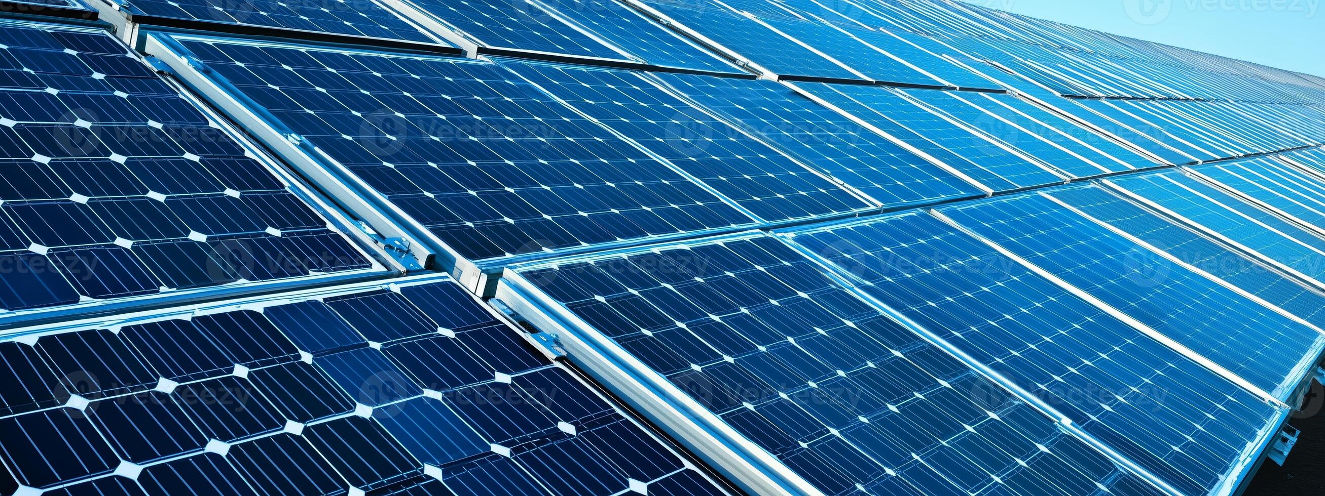 A close-up view of solar panels installed on a sunny day, showcasing renewable energy technology in action photo