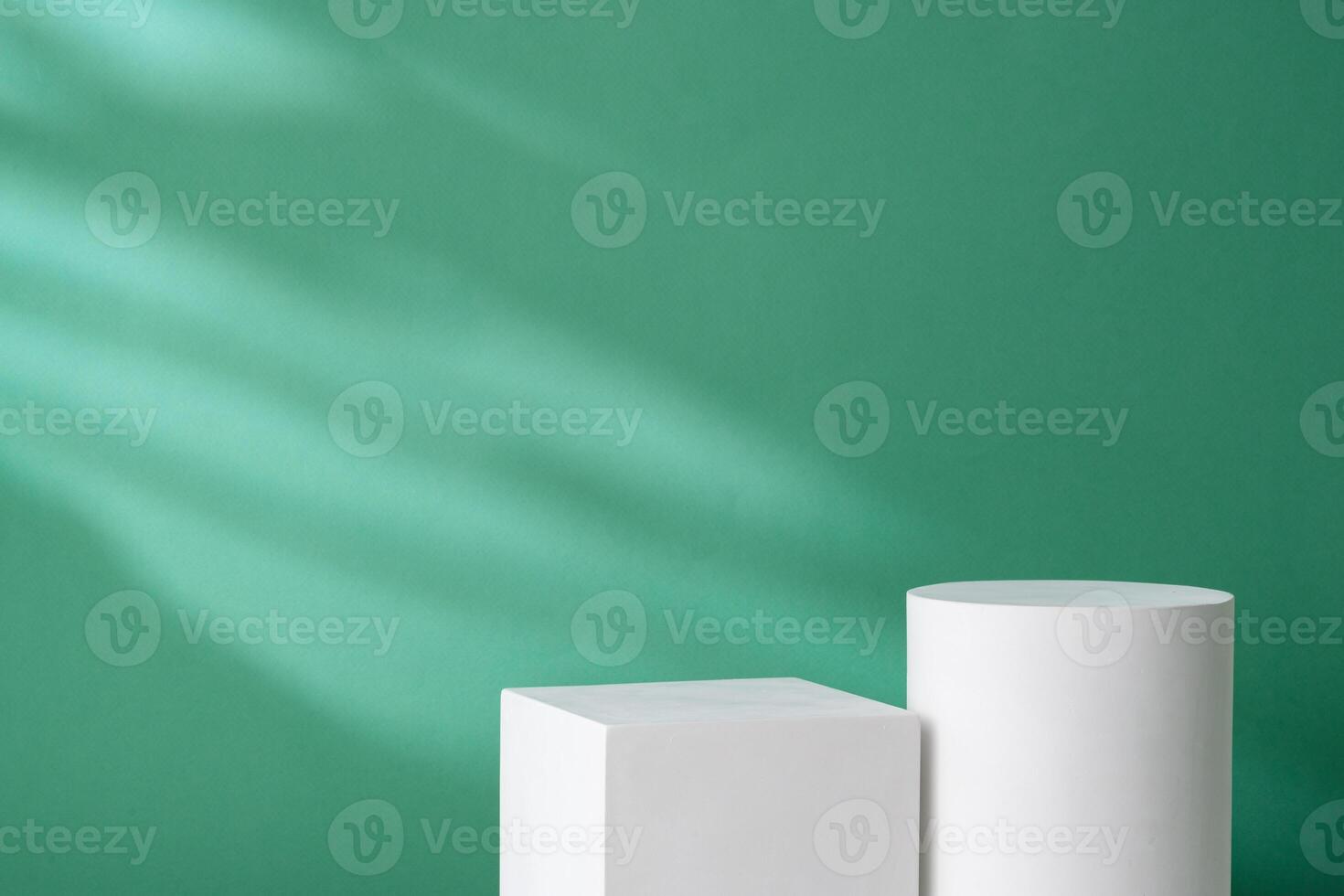 Simple geometric shapes on a green background with soft lighting photo