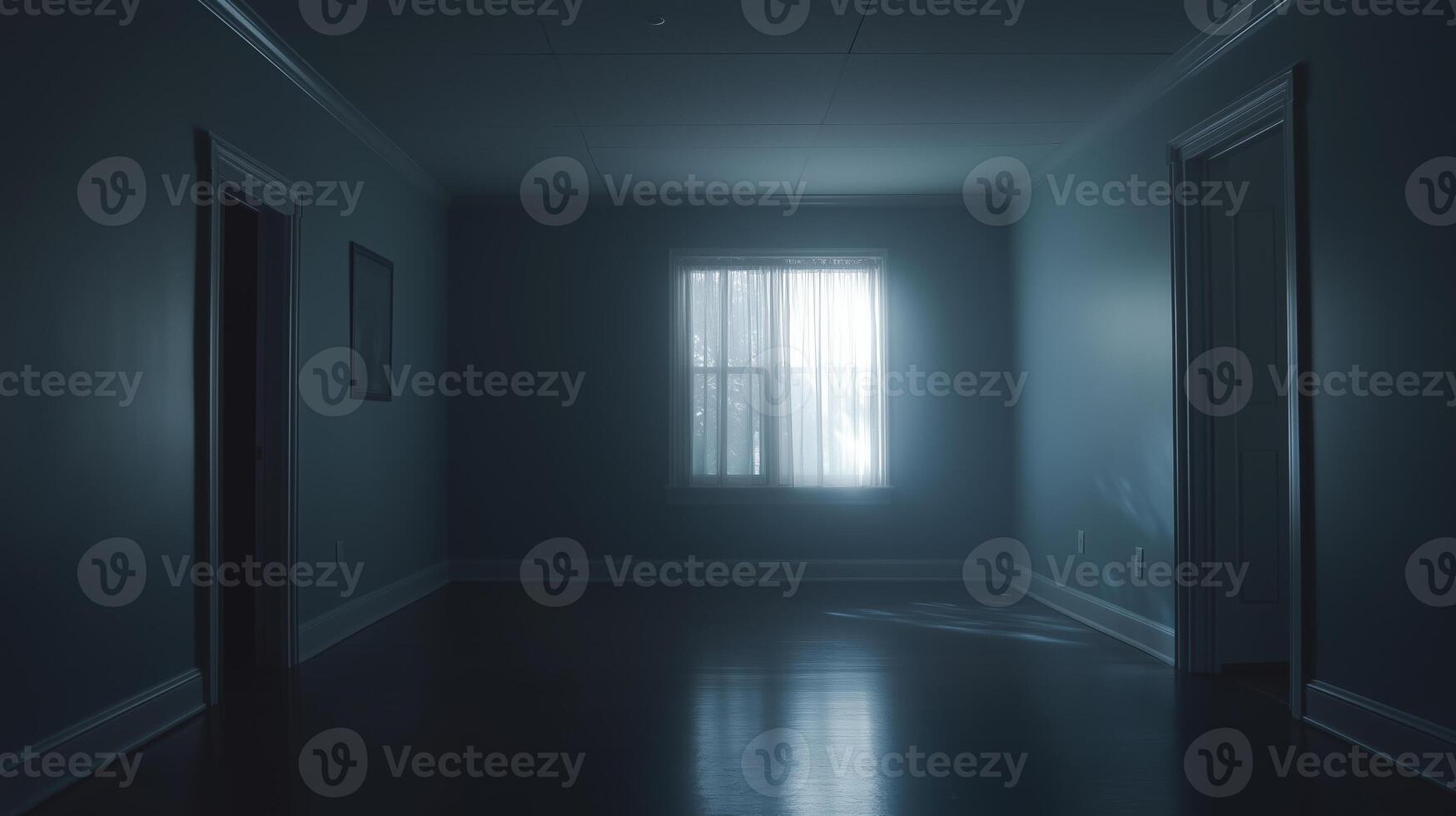 Empty dimly lit room with a solitary window casting soft light in a quiet atmosphere during the evening photo