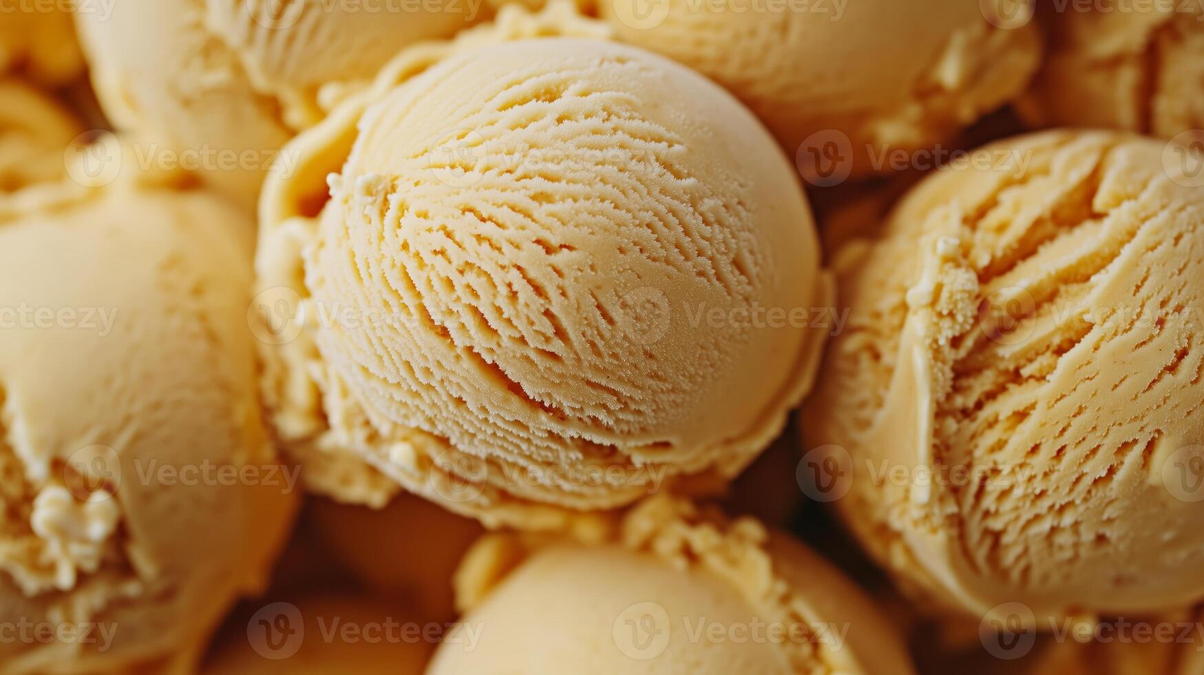 Delicious creamy scoops of vanilla ice cream piled together in a tempting display during summer heat photo
