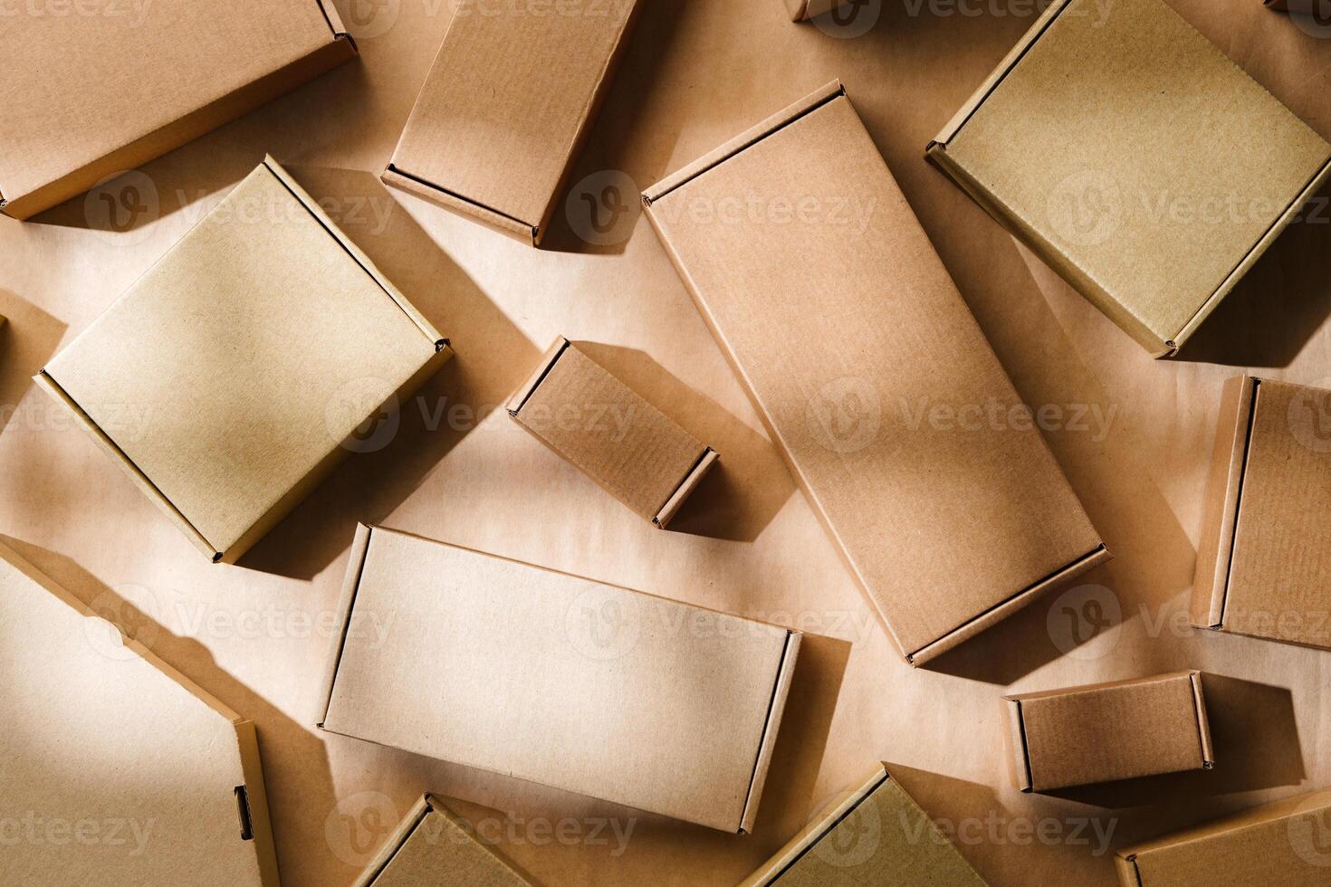 Multiple cardboard boxes arranged on a surface for packaging and shipping in a warehouse setting photo