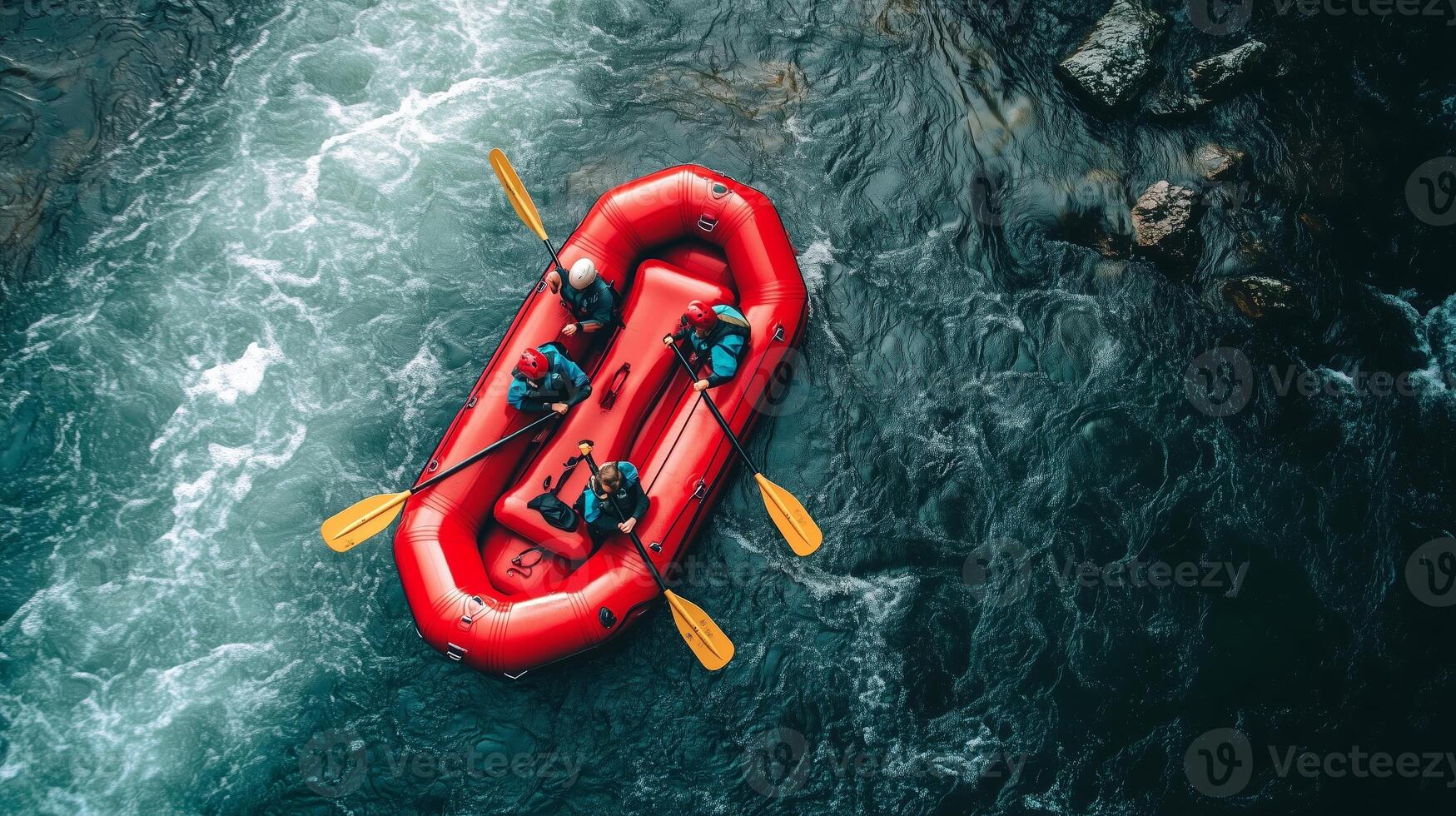 Group of four people rafting on a bright red inflatable boat in a fast-flowing river surrounded by rocks and greenery during a sunny day photo