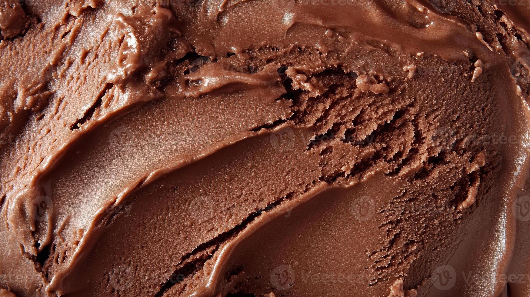 Rich chocolate ice cream texture displayed in a close-up view, inviting indulgence and sweetness in every scoop photo
