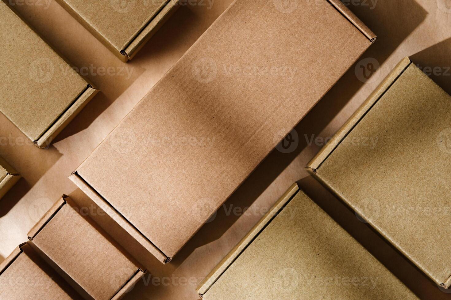 Multiple cardboard boxes arranged on a surface for packaging and shipping in a warehouse setting photo