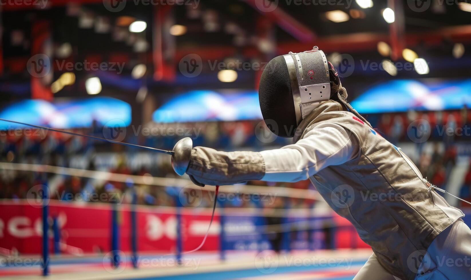 A fencer's body in action, with the opponent and fencing area in the background photo