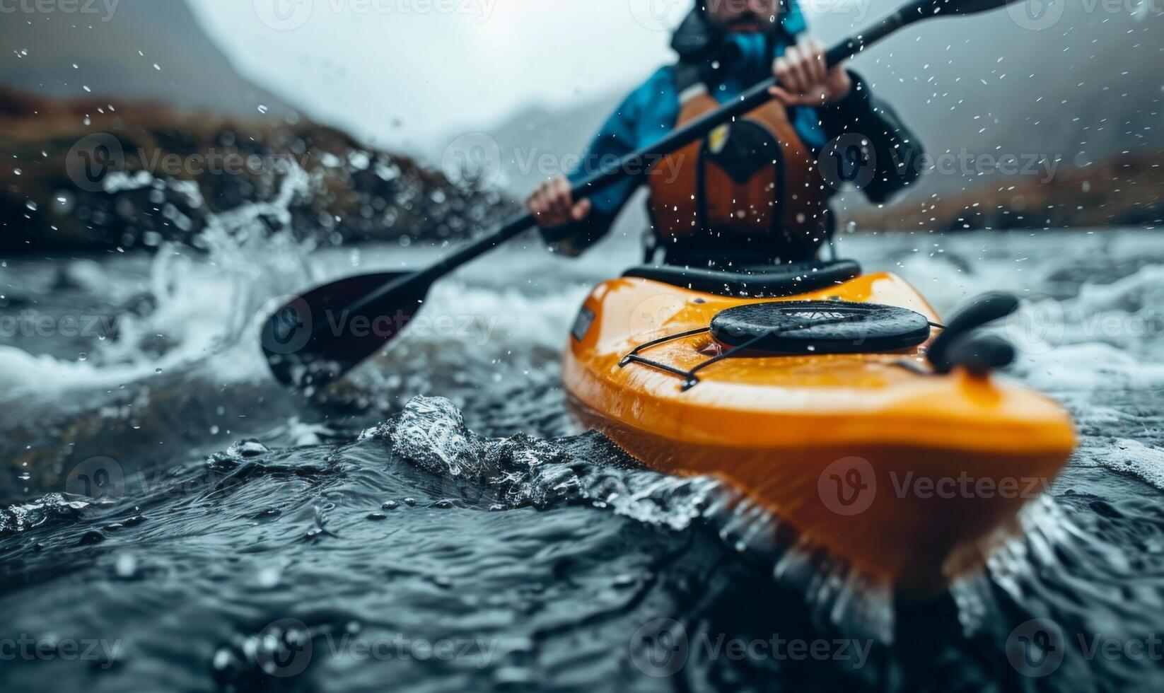 A kayaker's body and paddle in motion on a rapid river, with the surrounding landscape photo
