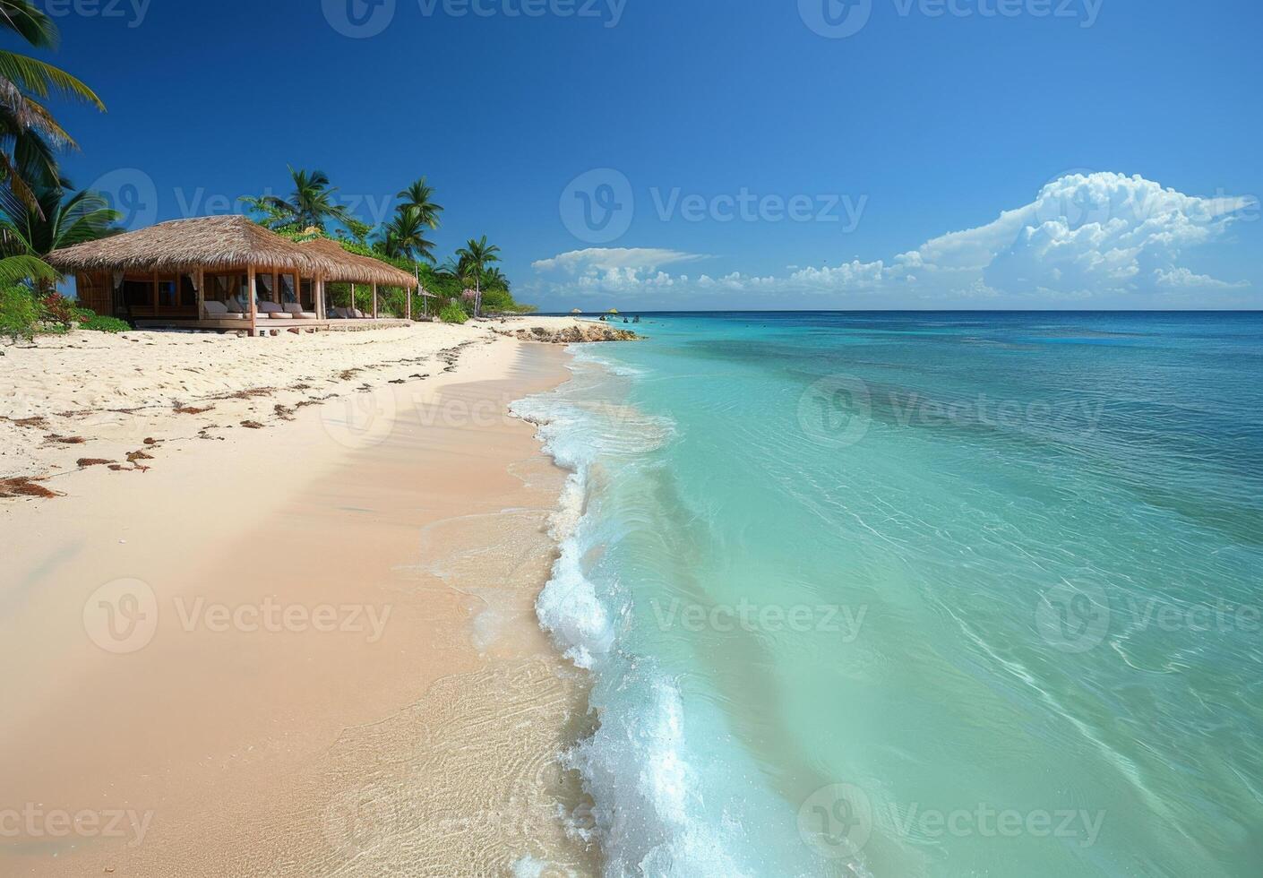 A pristine island beach with a luxurious cabana and well maintained amenities photo